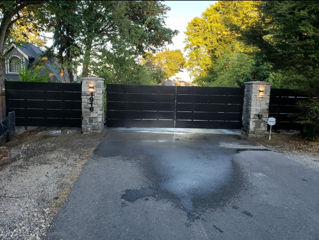 Setting the posts securely in place with concrete or gravel